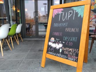 Tupi restaurant sign